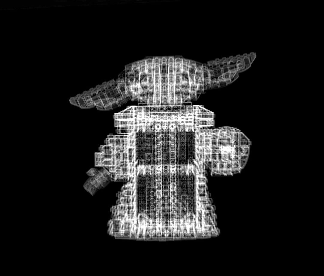 An x-ray-style image of a Lego Grogu figure, rendered in shades of white and gray against a stark black backdrop, with a see-through effect.