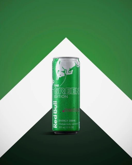 A vibrant, studio shot of a green 'The Green Edition' Red Bull can, set against a modern geometric background of white and green.