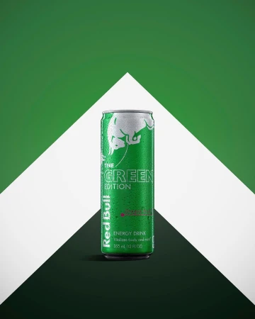 A vibrant, studio shot of a green 'The Green Edition' Red Bull can, set against a modern geometric background of white and green.