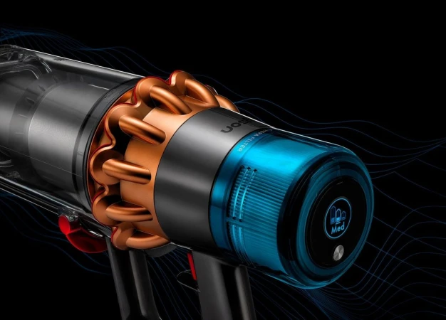Close-up studio shot of a Dyson vacuum cleaner, showcasing its cyclone technology, translucent dustbin, and sleek design on a black backdrop.
