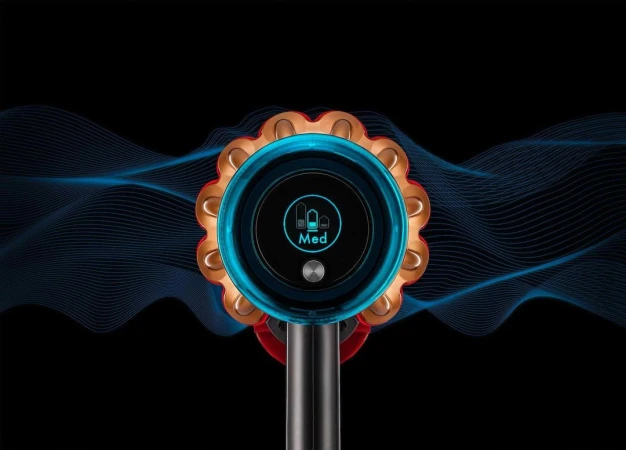 Close-up of a vacuum cleaner digital display screen glowing blue with wave lines against a black background