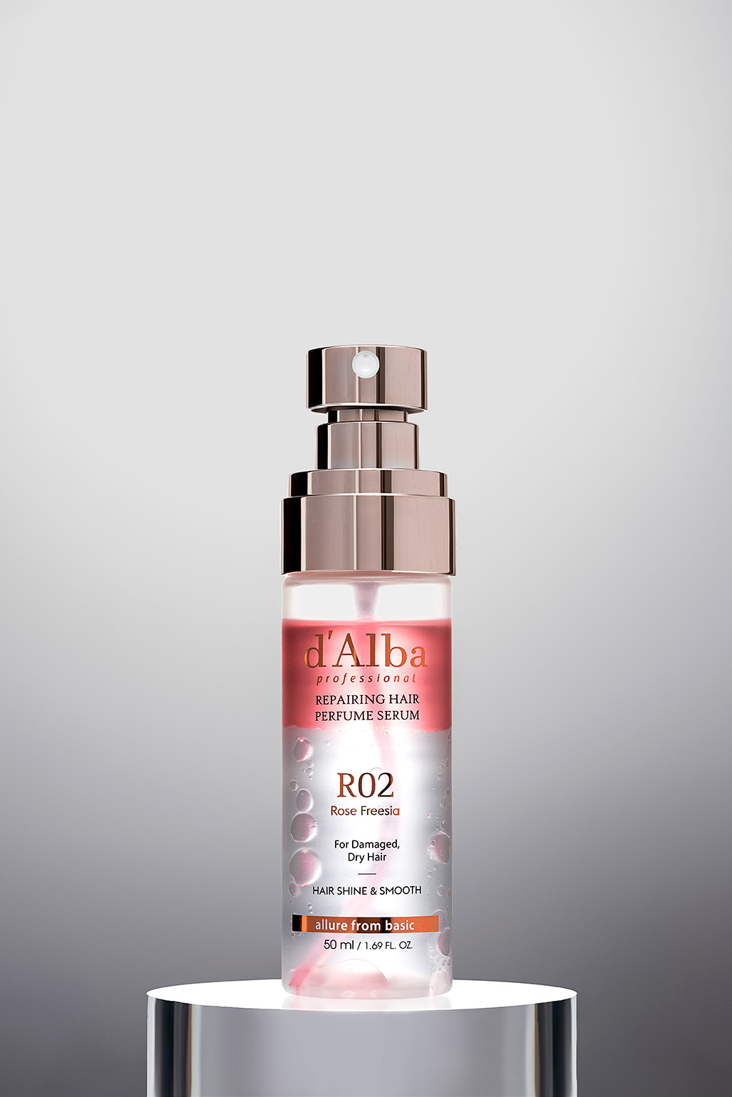 D'Alba Professional Repairing Hair Perfume Serum R02, against a gradient gray background on a white cylindrical display base.