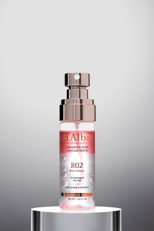 D'Alba Professional Repairing Hair Perfume Serum R02, against a gradient gray background on a white cylindrical display base.