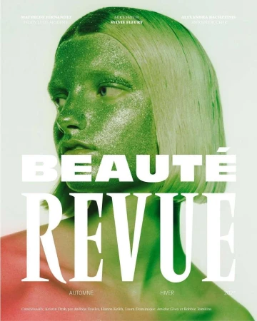 Magazine cover featuring a woman with glittery green skin and hair, against a bright background with stylized text overlay.