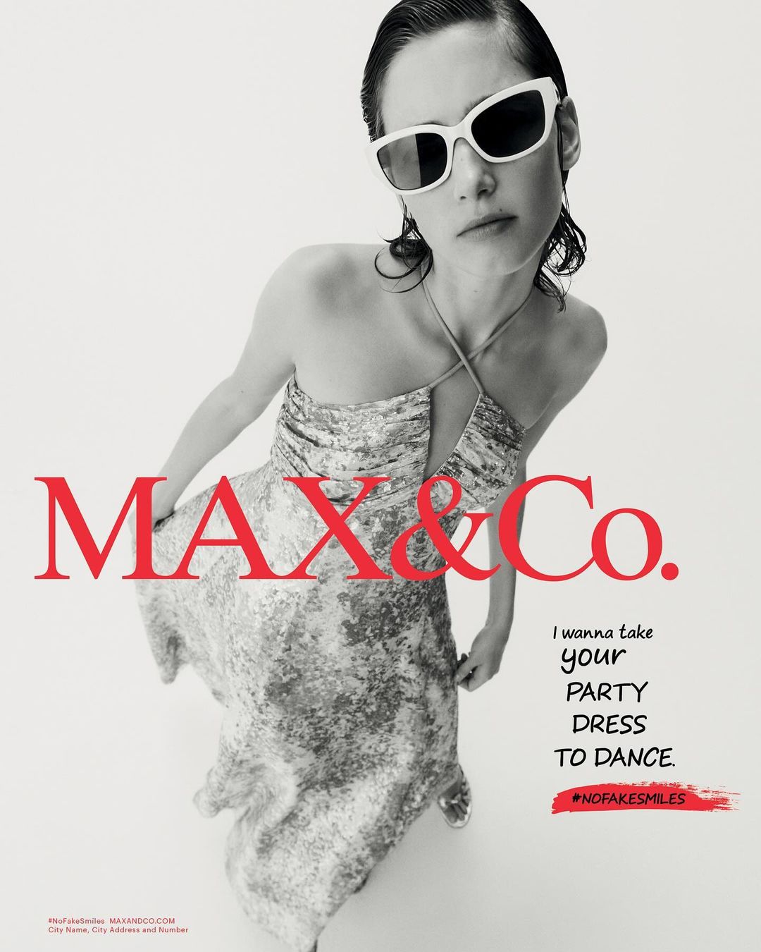 Fashion-forward woman in patterned dress and white sunglasses poses against a white background, with 'Max & Co.' logo in red.