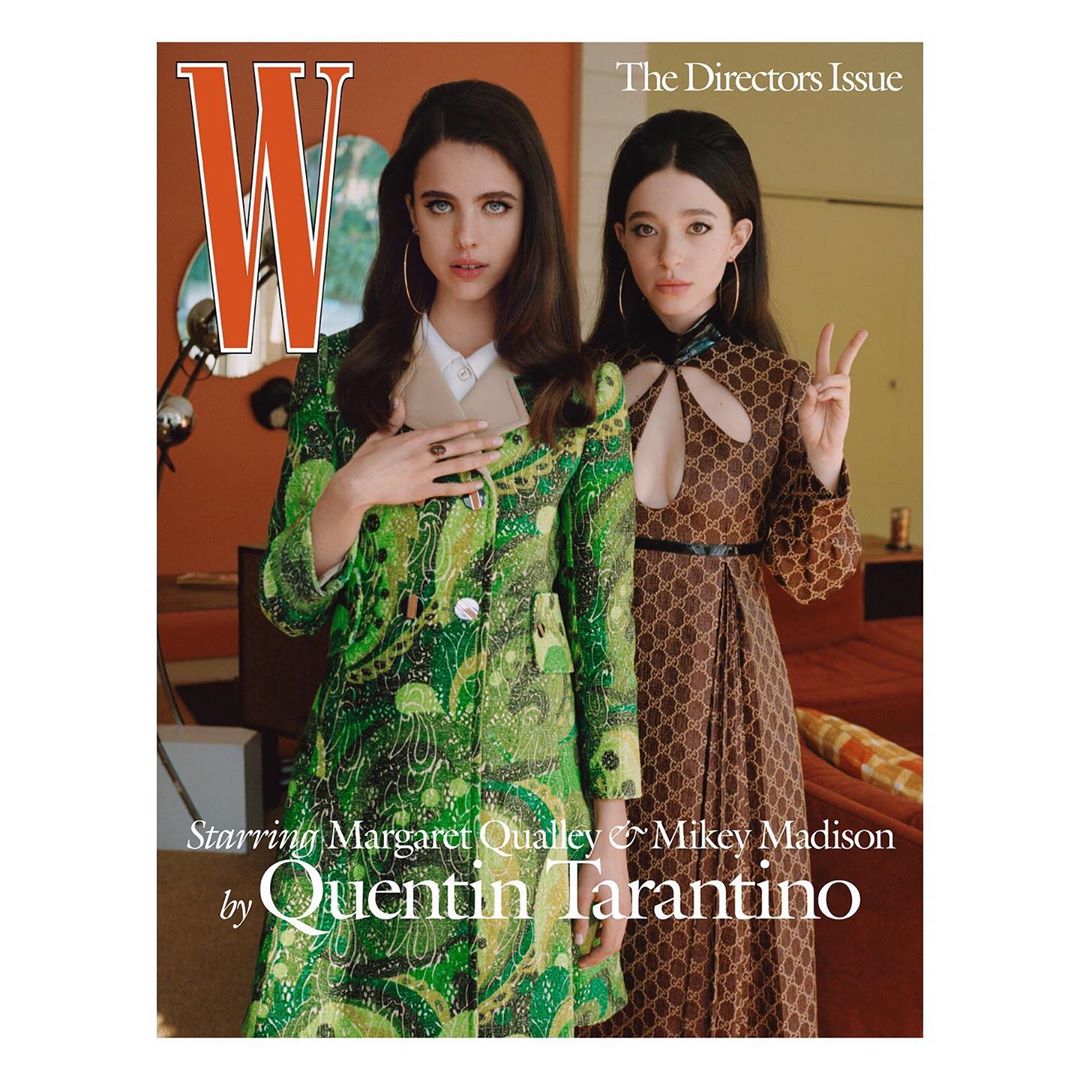 Magazine cover featuring Margaret Qualley and Mikey Madison in patterned outfits, posed indoors against a simple backdrop with retro-style decor.