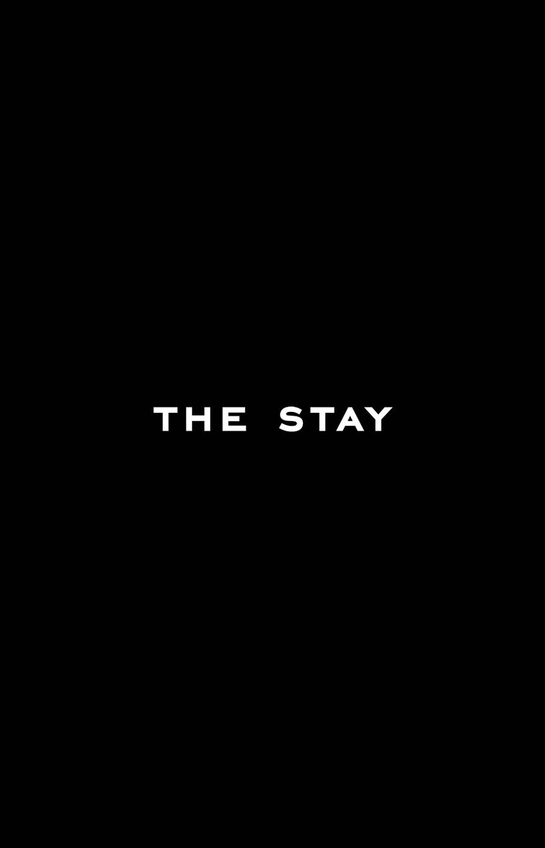White text "THE STAY" against a solid black background. Simple, modern graphic with high contrast and minimal visual elements.