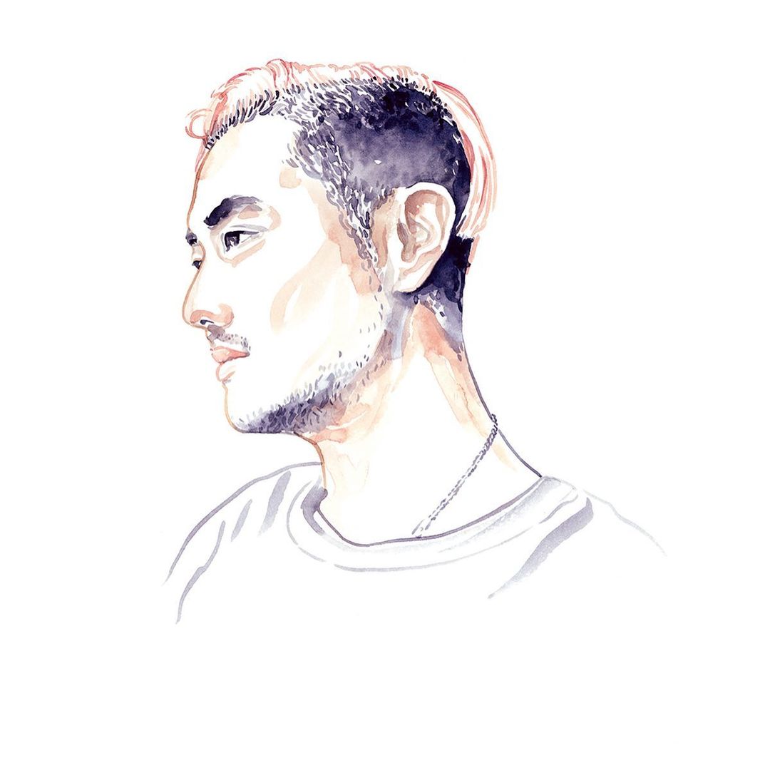 Watercolor portrait of a man with short black and blonde hair. The man is facing left and wearing a plain white t-shirt.