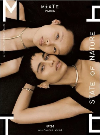 Two young models pose in a studio fashion cover with jewelry. The Mixte Paris cover, Fall/Winter 2024, has black background and beige skin tones.
