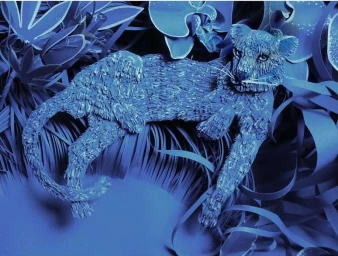 Monochromatic blue paper sculpture of a large cat lounging amidst intricately cut paper foliage and orchids.