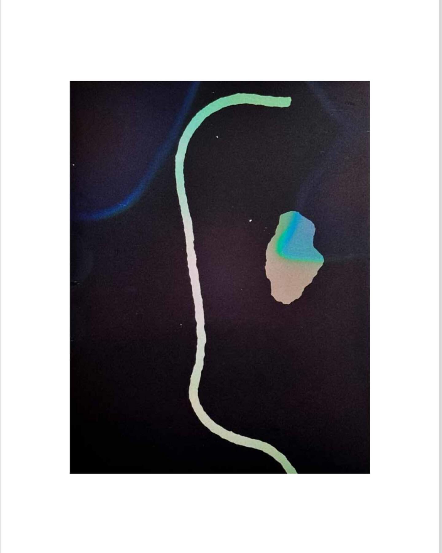 Abstract art with a curving, green line and a small, multicolored shape on a black background in a white frame.