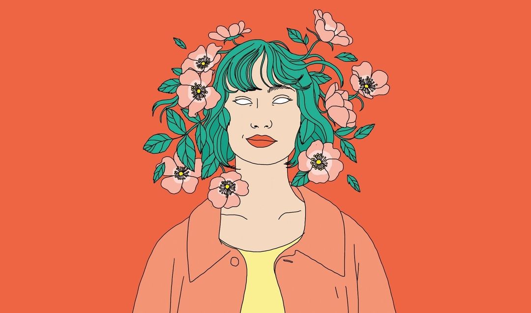 Illustration of a woman with blue hair wearing a peach jacket, surrounded by pink flowers against a coral background.