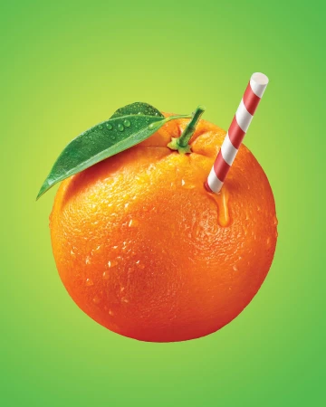 An orange fruit with a green leaf and a striped straw, set against a gradient green background, highlights the vibrant colors.