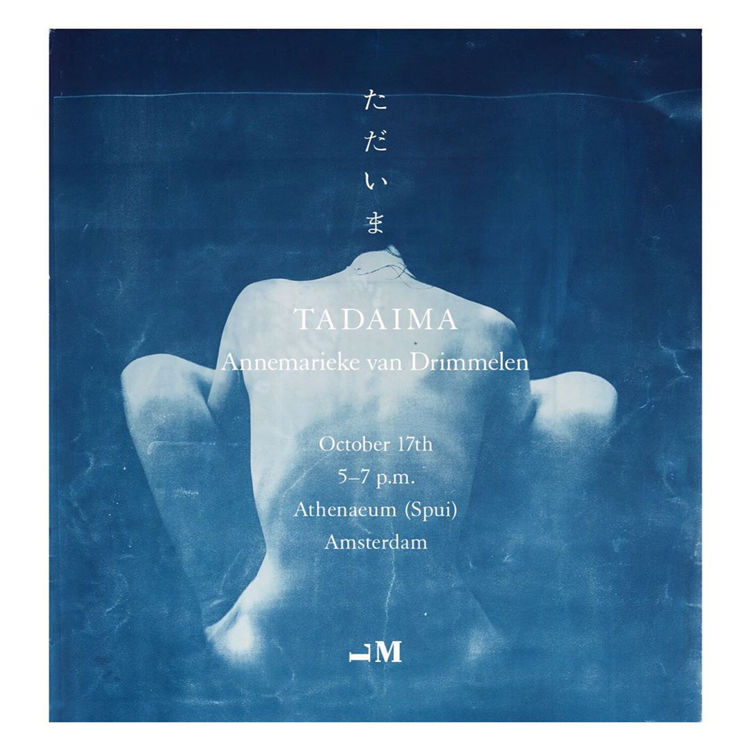 Artistic cyanotype featuring a nude adult female figure in a seated pose, complemented by text elements and monochromatic blue tones.