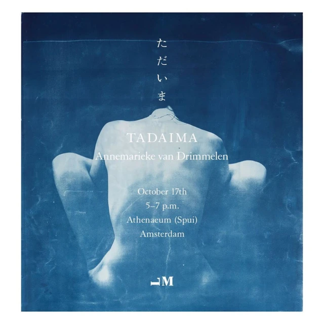 Artistic cyanotype featuring a nude adult female figure in a seated pose, complemented by text elements and monochromatic blue tones.