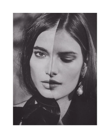 Monochromatic portrait of a split-face woman, one side with closed eyes and pearl earring, the other side with open eyes, stylish hair.