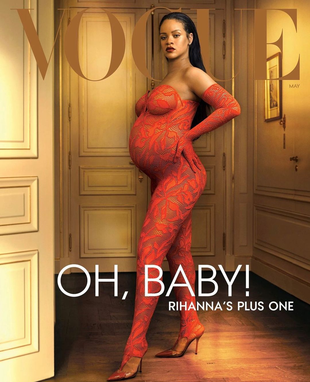 Vogue magazine cover featuring pregnant Rihanna in red strapless bodysuit and gloves, posing against an interior backdrop with white doors.