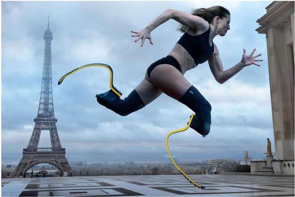 Athletic woman with prosthetic legs in motion, running in an urban setting with the Eiffel Tower in the background.
