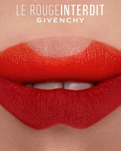 Close-up of bright red lipstick on lips, showcasing a cosmetic product with clean and detailed makeup for beauty advertising.