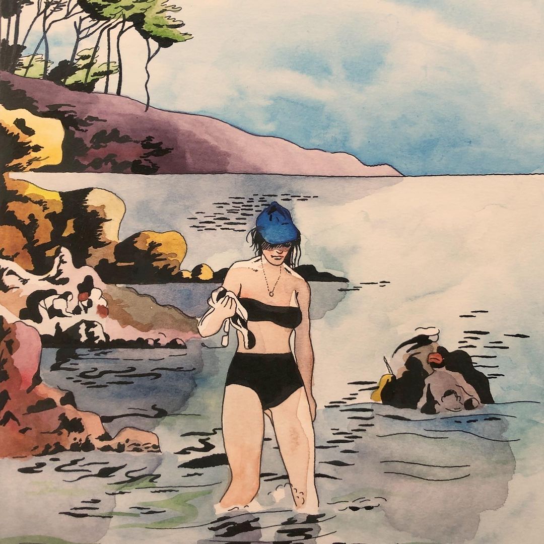 Illustration of a woman in a black bikini and blue cap standing in water, holding fabric, with a rocky coastline and trees in the background.
