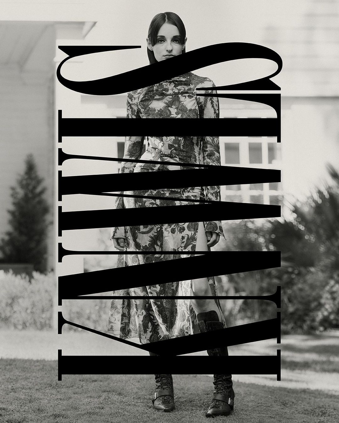 Editorial fashion shot of an adult female in floral dress and boots standing on a lawn in front of a white house, overlaid with text.