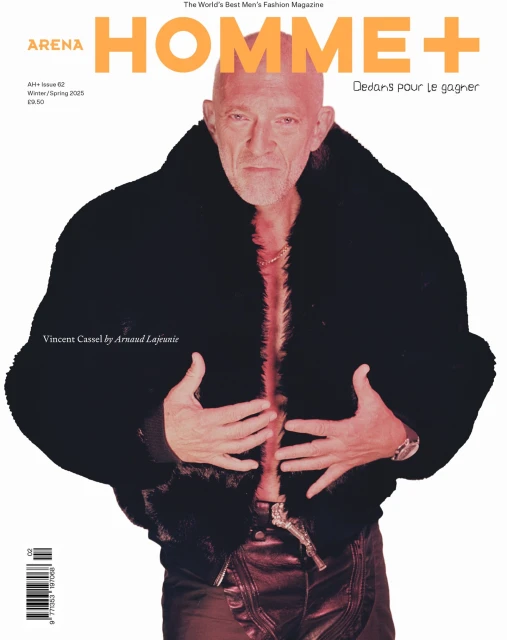 Magazine cover featuring Vincent Cassel wearing a fur coat and leather pants, posing against a white backdrop with the magazine's title.
