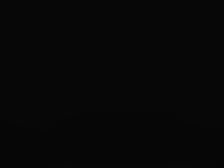 Solid black background with no discernible details or subjects visible in the frame, creating a sense of emptiness and darkness.