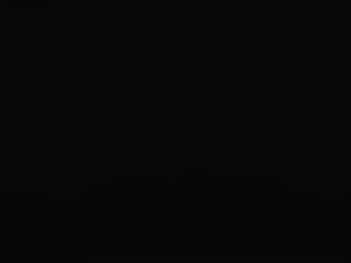 Solid black background with no discernible details or subjects visible in the frame, creating a sense of emptiness and darkness.