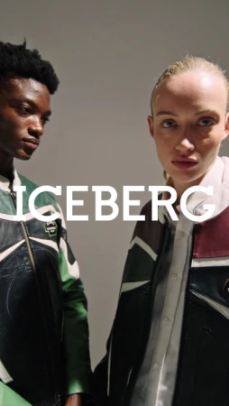 Two models wearing color-blocked leather jackets standing against a plain background with ICEBERG text overlay