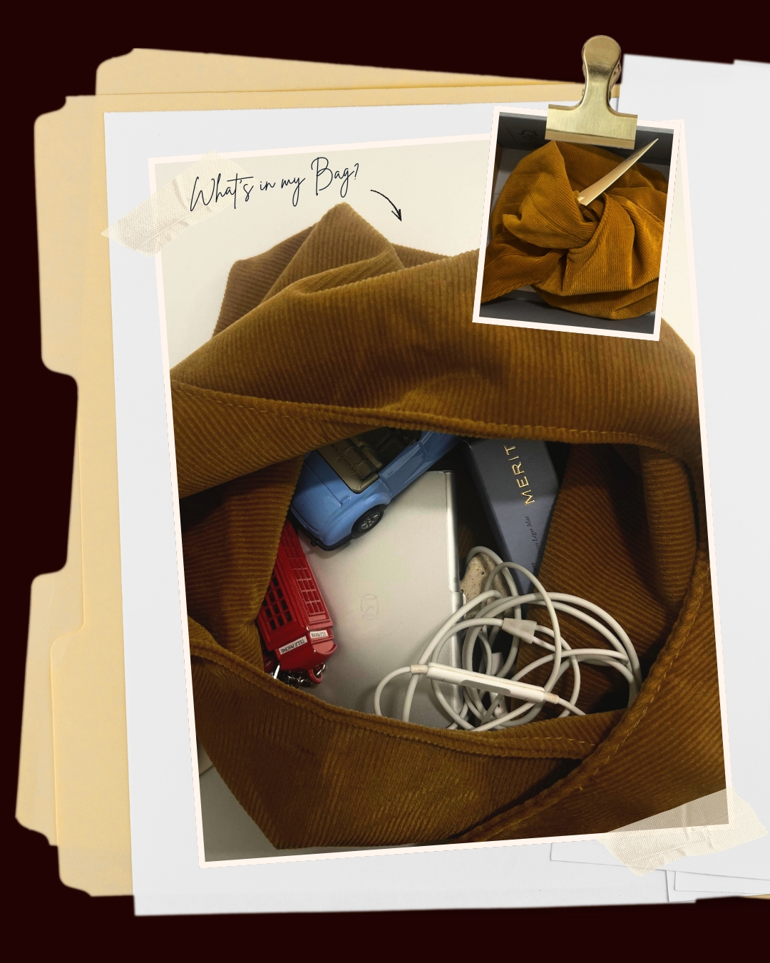 Corduroy tote bag filled with a toy car, white laptop, white headphones, and red double-decker bus toy, displayed on a desk.