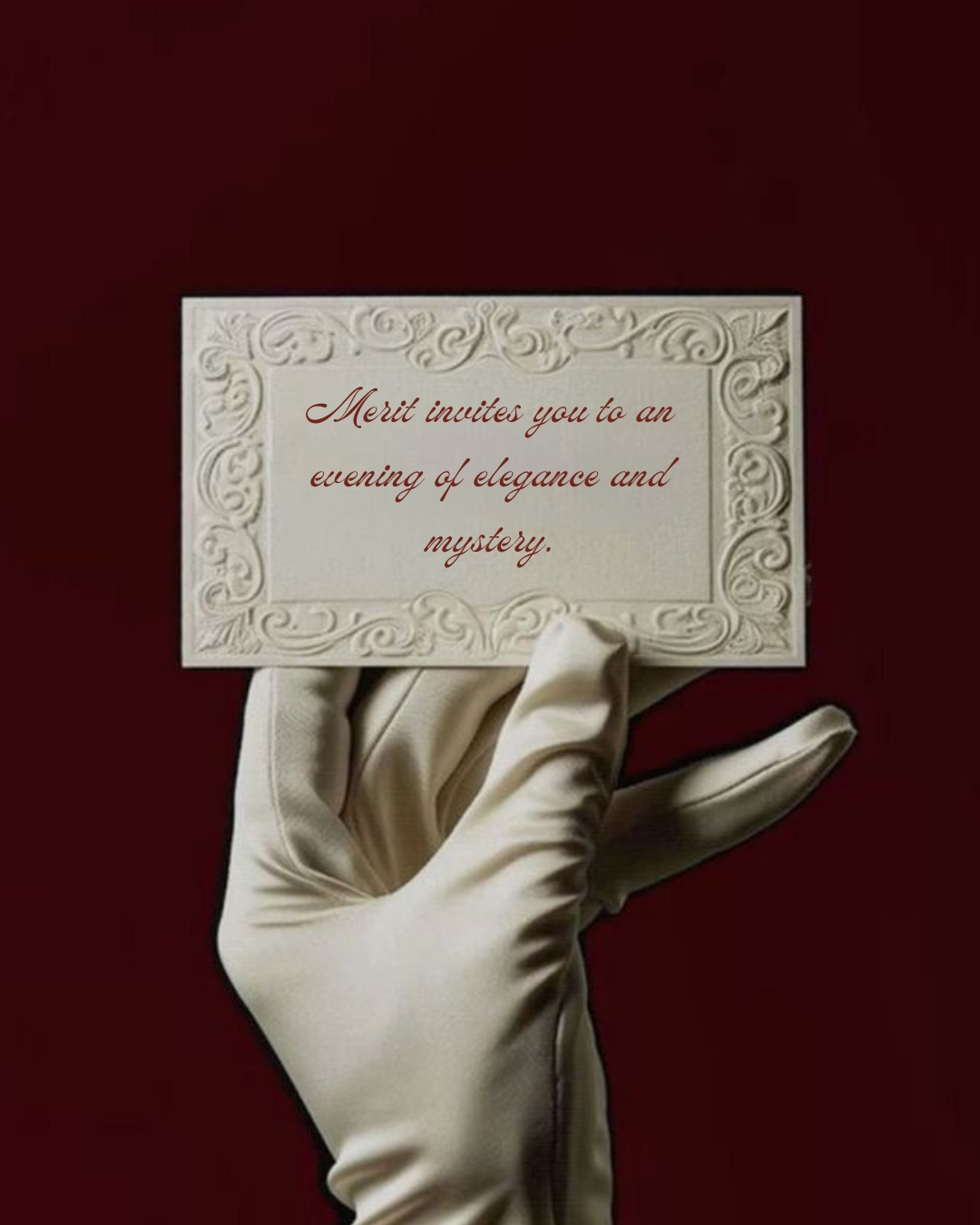 Elegant invitation being held by a hand in a white glove, with invitation text, 'Merit invites you to an evening of elegance and mystery'.