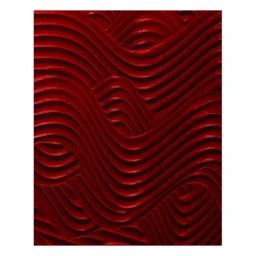 Close-up of deep red wavy textured ridges and flowing abstract lines photographed by Baker & Evans.