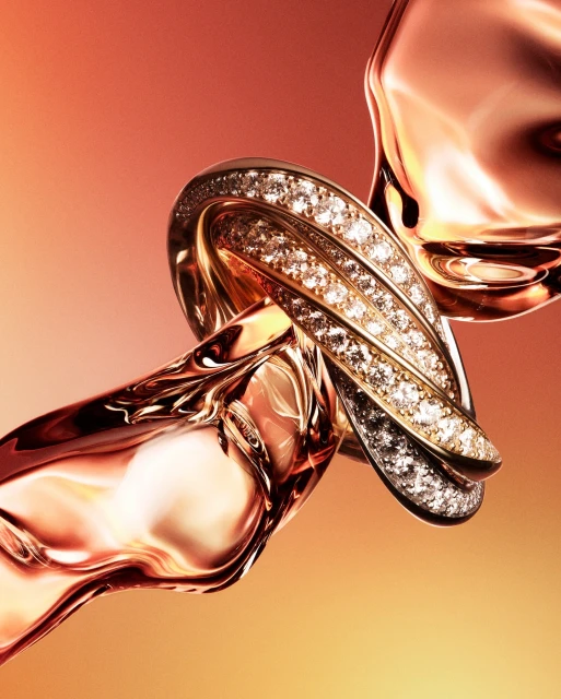 Gold knot ring with diamonds encircled by flowing amber liquid, studio shot on gradient background, luxury jewellery product shot.