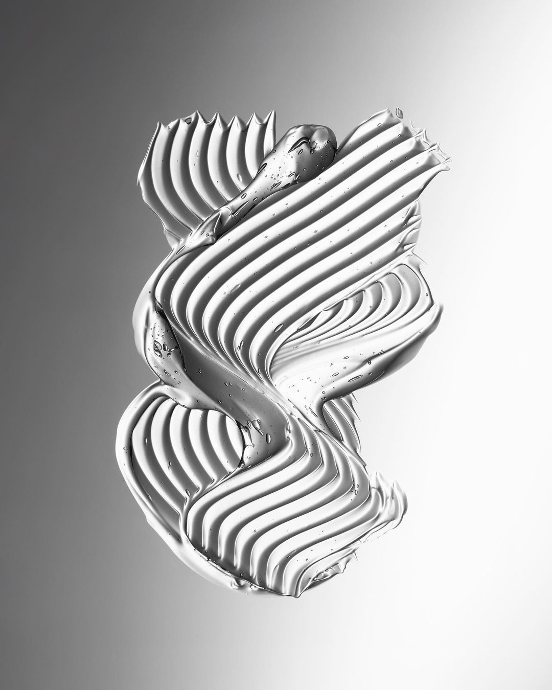 Textured silver cream swirls and ridges in abstract composition. Close-up studio shot on gray gradient background creates a smooth, shiny effect.