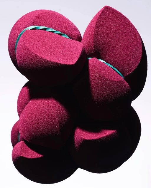 Abstract artwork featuring organic rounded forms in dark red, bound with teal bands, set against a plain background.