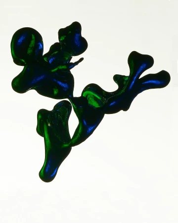 Abstract blue and green glossy ink blotches on a white background create an organic, flowing shape with vibrant color contrasts.