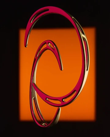 Abstract sculptural pink and gold metal object on a rectangular orange background against black