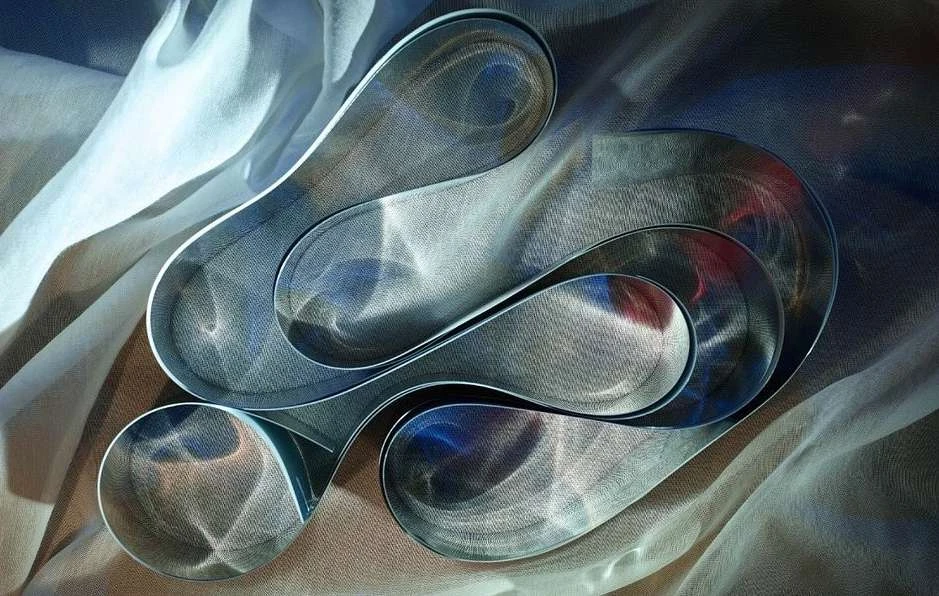 Abstract textile art piece featuring sheer draped fabric, metal mesh, and neutral color palette. Modern textile art, material study.
