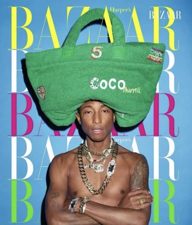 Pharrell Williams, shirtless, wearing jewelry and a handbag on his head, poses for a Bazaar cover against a blue background.
