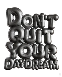Inflated metallic balloon lettering reading Dont Quit Your Daydream against a plain white background