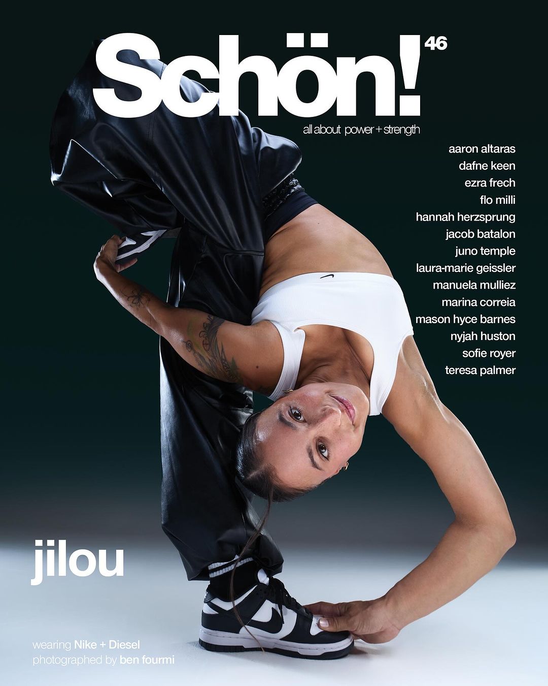 Magazine cover featuring an adult female in athletic wear posing upside down, wearing Nike sneakers and black tracksuit bottoms, set against a dark backdrop.