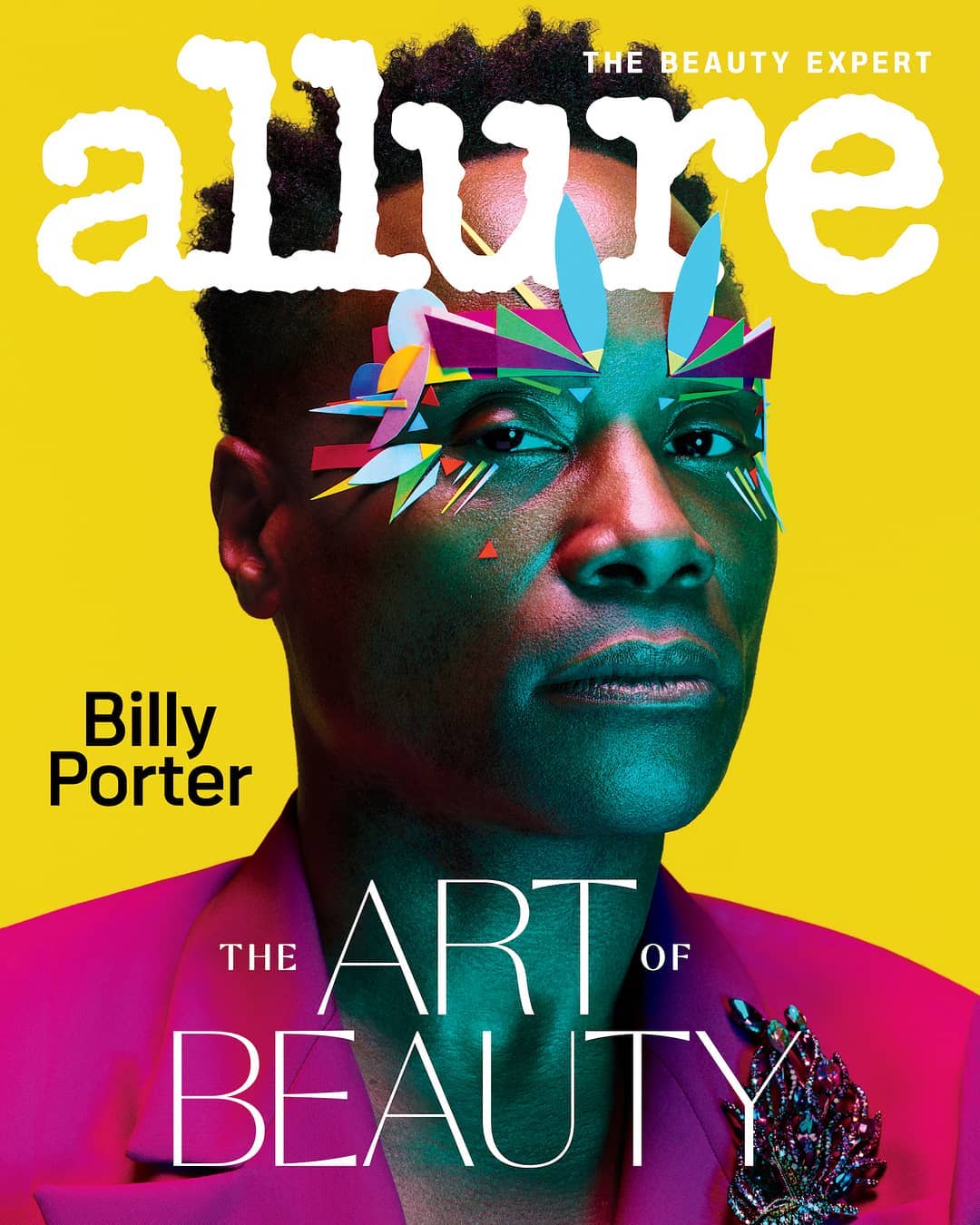 Allure magazine cover featuring Billy Porter with colorful geometric makeup and pink suit against a yellow background.