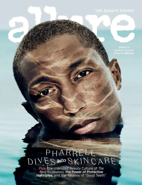 Magazine cover featuring Pharrell Williams in water, promoting skincare, with 'Allure' logo and related headlines.