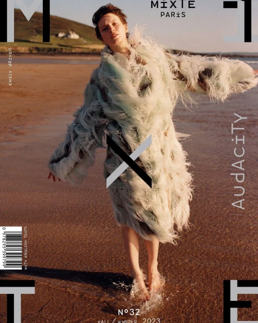 Magazine cover featuring a slender woman on a beach, adorned in a feathery coat, with the title 'MIXTE' displayed.