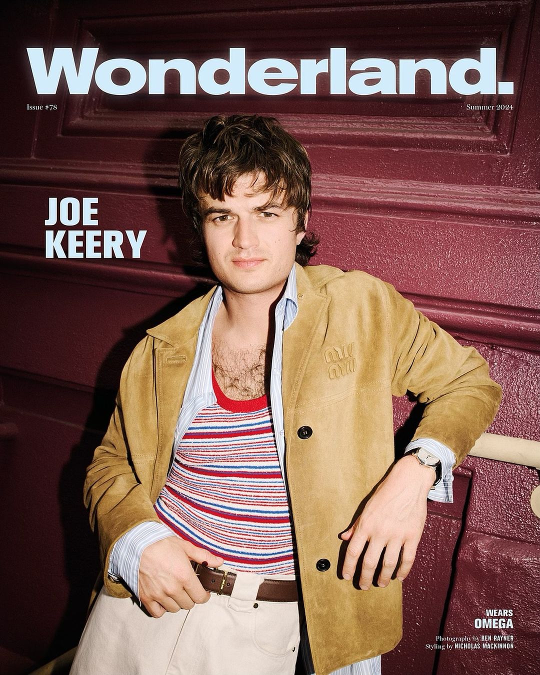 Magazine cover featuring Joe Keery, wearing a striped shirt and suede jacket, set against a burgundy door. Wonderland, January 2020.