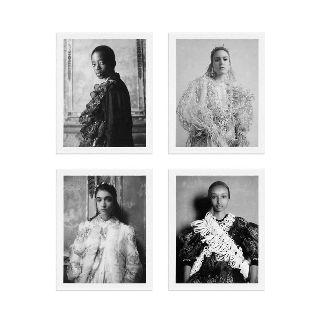 Four black-and-white fashion portraits of women, each in unique ornate collars and garments, set against textured neutral backgrounds.