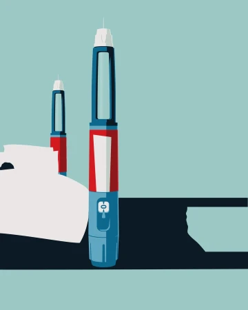 Two insulin pens with red and white labels, a medical device used for diabetes management, set against a light blue background.