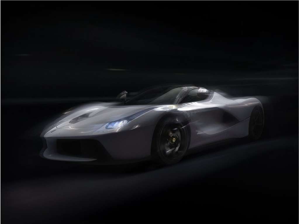 Sleek white Ferrari LaFerrari supercar speeding against a dark background, showcasing its aerodynamics and high-performance design.