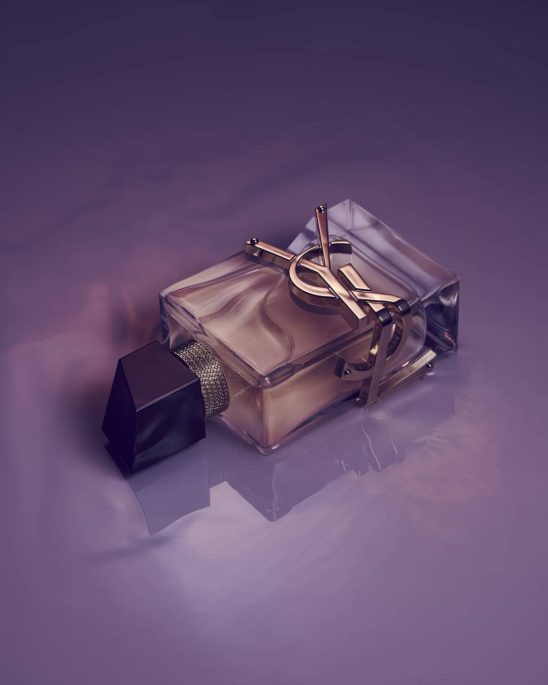 Close-up studio shot of a luxury perfume bottle with a gold logo on a glossy purple surface, showcasing its elegant design and branding.