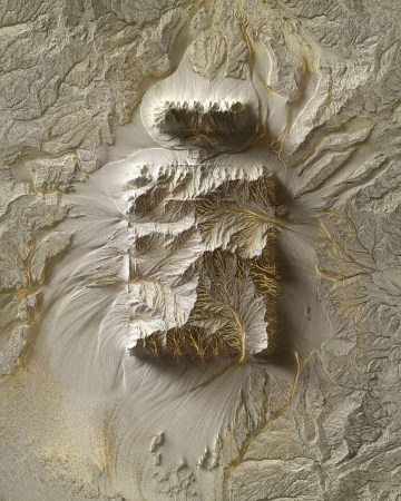 Aerial view of an abstracted landscape topography featuring smooth gradients, branching streams and ridges, and a square plateau.